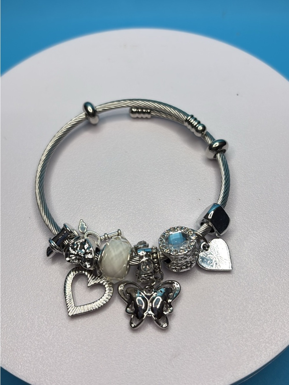 Silver Charm Bracelet with Blue and White Accents and Heart & Butterfly Charms